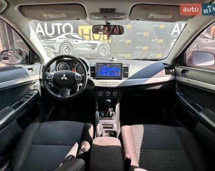 Белый Мицубиси Лансер, объемом двигателя 2 л и пробегом 124 тыс. км за 7700 $, фото 11 на Automoto.ua