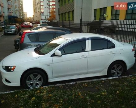 Белый Мицубиси Лансер, объемом двигателя 1.59 л и пробегом 110 тыс. км за 7300 $, фото 1 на Automoto.ua