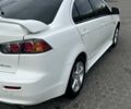 Белый Мицубиси Лансер, объемом двигателя 2 л и пробегом 210 тыс. км за 9700 $, фото 7 на Automoto.ua