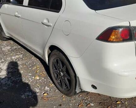 Білий Міцубісі Lancer, об'ємом двигуна 1.6 л та пробігом 113 тис. км за 7300 $, фото 2 на Automoto.ua
