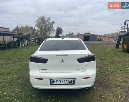 Белый Мицубиси Лансер, объемом двигателя 1.59 л и пробегом 163 тыс. км за 6700 $, фото 6 на Automoto.ua