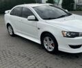 Белый Мицубиси Лансер, объемом двигателя 2 л и пробегом 210 тыс. км за 9700 $, фото 4 на Automoto.ua