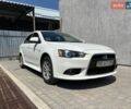 Белый Мицубиси Лансер, объемом двигателя 1.59 л и пробегом 170 тыс. км за 6900 $, фото 1 на Automoto.ua