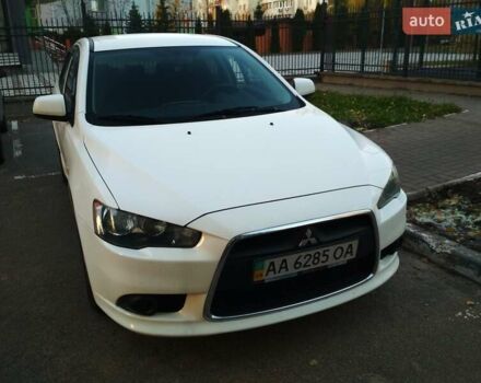 Белый Мицубиси Лансер, объемом двигателя 1.59 л и пробегом 110 тыс. км за 7300 $, фото 8 на Automoto.ua