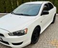 Білий Міцубісі Lancer, об'ємом двигуна 2 л та пробігом 238 тис. км за 7899 $, фото 1 на Automoto.ua