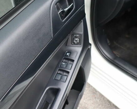 Белый Мицубиси Лансер, объемом двигателя 1.59 л и пробегом 130 тыс. км за 8500 $, фото 36 на Automoto.ua