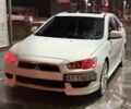 Белый Мицубиси Лансер, объемом двигателя 2 л и пробегом 210 тыс. км за 9700 $, фото 1 на Automoto.ua
