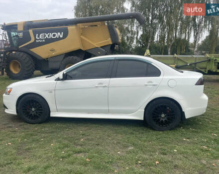 Белый Мицубиси Лансер, объемом двигателя 1.59 л и пробегом 163 тыс. км за 6700 $, фото 2 на Automoto.ua