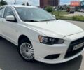 Белый Мицубиси Лансер, объемом двигателя 1.59 л и пробегом 170 тыс. км за 5500 $, фото 1 на Automoto.ua