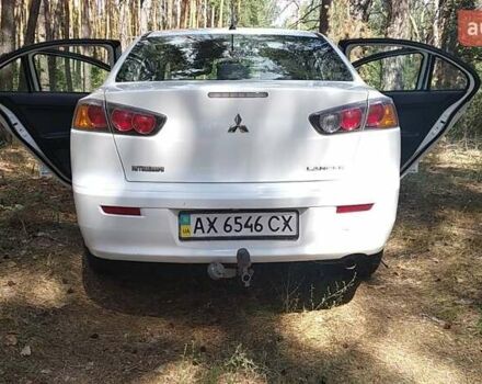 Білий Міцубісі Lancer, об'ємом двигуна 1.6 л та пробігом 155 тис. км за 9000 $, фото 6 на Automoto.ua