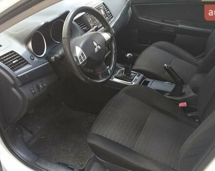 Білий Міцубісі Lancer, об'ємом двигуна 1.6 л та пробігом 155 тис. км за 9000 $, фото 10 на Automoto.ua