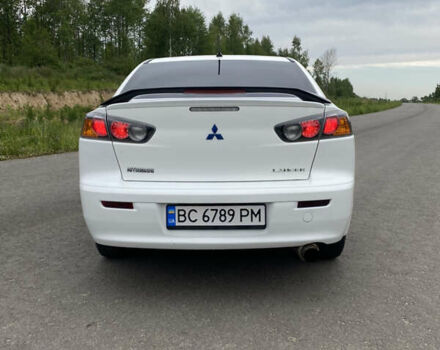 Білий Міцубісі Lancer, об'ємом двигуна 2 л та пробігом 208 тис. км за 8700 $, фото 13 на Automoto.ua