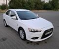 Белый Мицубиси Лансер, объемом двигателя 1.6 л и пробегом 260 тыс. км за 6038 $, фото 1 на Automoto.ua