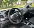 Білий Міцубісі Lancer, об'ємом двигуна 1.58 л та пробігом 99 тис. км за 8500 $, фото 14 на Automoto.ua