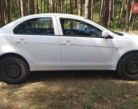 Білий Міцубісі Lancer, об'ємом двигуна 1.6 л та пробігом 155 тис. км за 9000 $, фото 14 на Automoto.ua