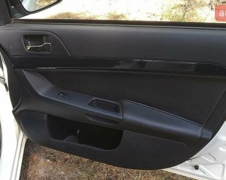 Білий Міцубісі Lancer, об'ємом двигуна 1.6 л та пробігом 155 тис. км за 9000 $, фото 2 на Automoto.ua