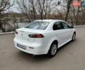 Білий Міцубісі Lancer, об'ємом двигуна 1.6 л та пробігом 68 тис. км за 9500 $, фото 3 на Automoto.ua
