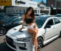 Білий Міцубісі Lancer, об'ємом двигуна 2 л та пробігом 130 тис. км за 13000 $, фото 1 на Automoto.ua
