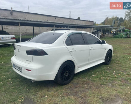 Белый Мицубиси Лансер, объемом двигателя 1.59 л и пробегом 163 тыс. км за 6700 $, фото 8 на Automoto.ua