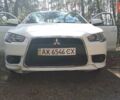Білий Міцубісі Lancer, об'ємом двигуна 1.6 л та пробігом 155 тис. км за 9000 $, фото 1 на Automoto.ua