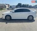 Белый Мицубиси Лансер, объемом двигателя 1.6 л и пробегом 238 тыс. км за 8500 $, фото 5 на Automoto.ua