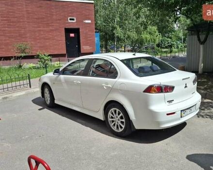 Белый Мицубиси Лансер, объемом двигателя 1.6 л и пробегом 163 тыс. км за 8000 $, фото 2 на Automoto.ua