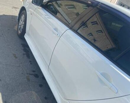 Белый Мицубиси Лансер, объемом двигателя 1.6 л и пробегом 238 тыс. км за 8500 $, фото 1 на Automoto.ua