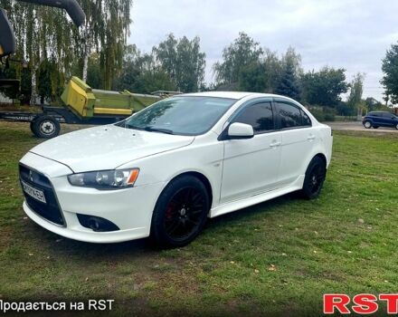Білий Міцубісі Lancer, об'ємом двигуна 1.6 л та пробігом 162 тис. км за 6500 $, фото 1 на Automoto.ua