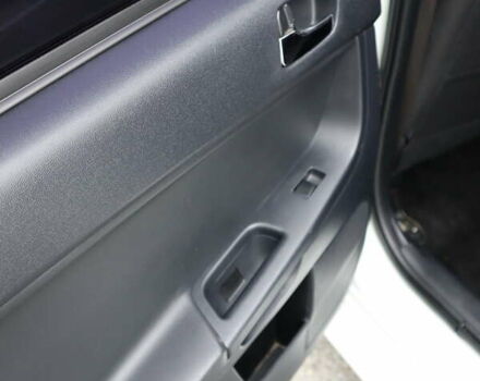 Белый Мицубиси Лансер, объемом двигателя 1.59 л и пробегом 130 тыс. км за 8500 $, фото 44 на Automoto.ua