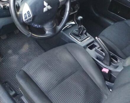 Белый Мицубиси Лансер, объемом двигателя 1.59 л и пробегом 110 тыс. км за 7300 $, фото 13 на Automoto.ua