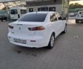 Білий Міцубісі Lancer, об'ємом двигуна 1.6 л та пробігом 260 тис. км за 6500 $, фото 1 на Automoto.ua