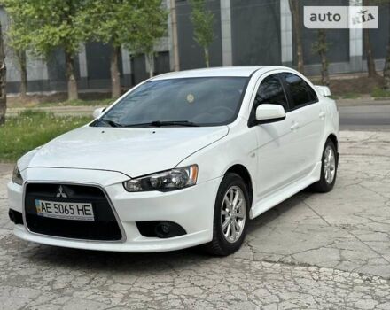 Білий Міцубісі Lancer, об'ємом двигуна 1.58 л та пробігом 99 тис. км за 8500 $, фото 3 на Automoto.ua