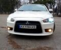 Білий Міцубісі Lancer, об'ємом двигуна 1.6 л та пробігом 137 тис. км за 7999 $, фото 1 на Automoto.ua