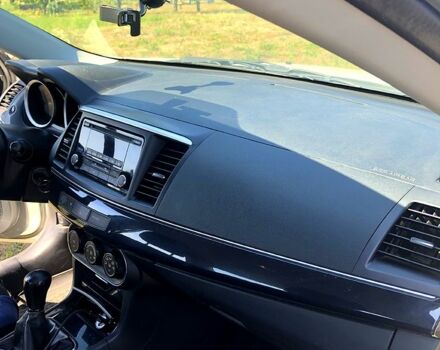 Белый Мицубиси Лансер, объемом двигателя 1.6 л и пробегом 106 тыс. км за 9600 $, фото 3 на Automoto.ua