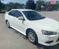 Белый Мицубиси Лансер, объемом двигателя 1.6 л и пробегом 238 тыс. км за 8500 $, фото 1 на Automoto.ua