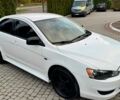 Білий Міцубісі Lancer, об'ємом двигуна 2 л та пробігом 238 тис. км за 7899 $, фото 5 на Automoto.ua