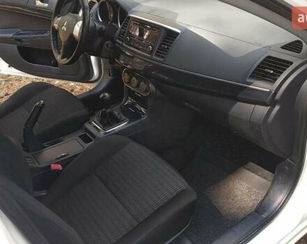 Білий Міцубісі Lancer, об'ємом двигуна 1.6 л та пробігом 155 тис. км за 9000 $, фото 1 на Automoto.ua