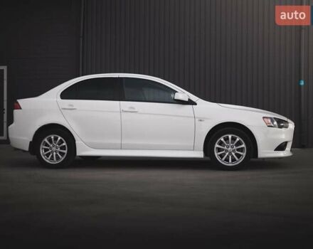 Білий Міцубісі Lancer, об'ємом двигуна 1.6 л та пробігом 247 тис. км за 8200 $, фото 2 на Automoto.ua
