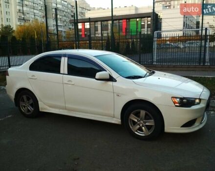 Белый Мицубиси Лансер, объемом двигателя 1.59 л и пробегом 110 тыс. км за 7300 $, фото 2 на Automoto.ua