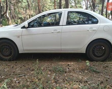 Білий Міцубісі Lancer, об'ємом двигуна 1.6 л та пробігом 155 тис. км за 9000 $, фото 13 на Automoto.ua