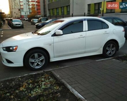 Белый Мицубиси Лансер, объемом двигателя 1.59 л и пробегом 110 тыс. км за 7300 $, фото 3 на Automoto.ua