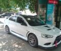 Білий Міцубісі Lancer, об'ємом двигуна 2 л та пробігом 130 тис. км за 13000 $, фото 2 на Automoto.ua