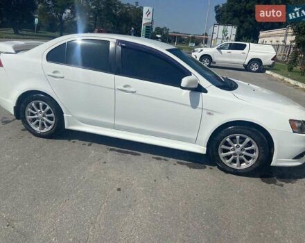 Белый Мицубиси Лансер, объемом двигателя 1.6 л и пробегом 238 тыс. км за 8500 $, фото 2 на Automoto.ua