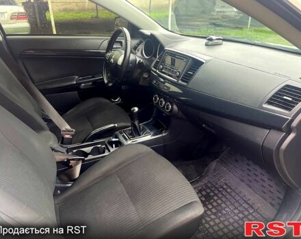 Білий Міцубісі Lancer, об'ємом двигуна 1.6 л та пробігом 162 тис. км за 6500 $, фото 7 на Automoto.ua