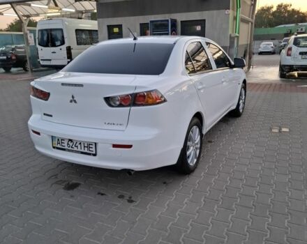 Белый Мицубиси Лансер, объемом двигателя 1.6 л и пробегом 260 тыс. км за 6500 $, фото 2 на Automoto.ua