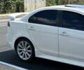 Белый Мицубиси Лансер, объемом двигателя 2 л и пробегом 210 тыс. км за 9700 $, фото 11 на Automoto.ua