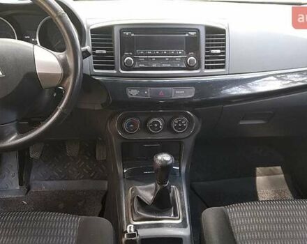 Білий Міцубісі Lancer, об'ємом двигуна 1.6 л та пробігом 155 тис. км за 9000 $, фото 9 на Automoto.ua