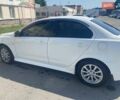 Белый Мицубиси Лансер, объемом двигателя 1.6 л и пробегом 238 тыс. км за 8500 $, фото 7 на Automoto.ua