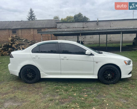 Белый Мицубиси Лансер, объемом двигателя 1.59 л и пробегом 163 тыс. км за 6700 $, фото 4 на Automoto.ua