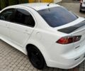 Білий Міцубісі Lancer, об'ємом двигуна 2 л та пробігом 238 тис. км за 7899 $, фото 21 на Automoto.ua